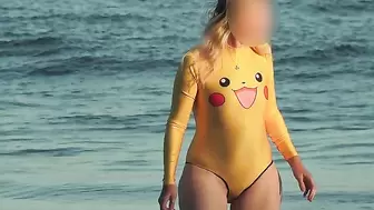 Swimsuit pussy shows sheer transparent beach.avi