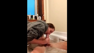 Wanking daddy's 9 inch giant dong while he baths