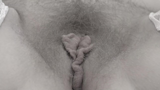 I fuck my hairy cunt and butt with a large dildo until climax