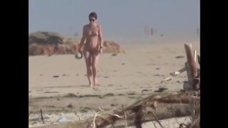 Nude walking on beach