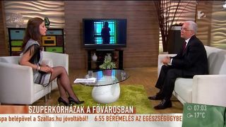 Long legs in black pantyhose on TV 7