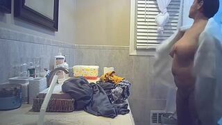 Spycam Unaware wife after shower